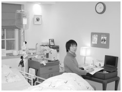 写真:勉強中の中西さん