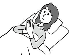 図6 胸の前で両手を合わせて押し合う運動