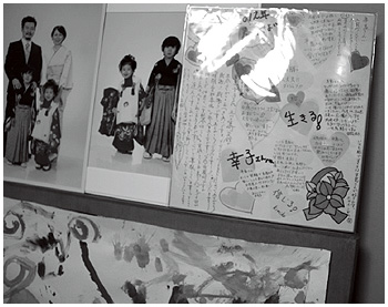 お孫さんの七五三の写真とブーゲンビリアのスタッフからの寄せ書き