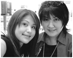 写真：闘病を支えてくれた妹の智子さん（左）と